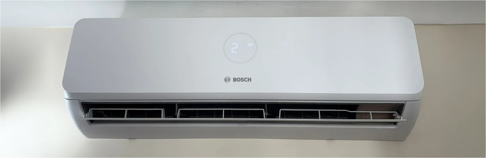 Close-up of a Bosch indoor wall unit with its air vents open