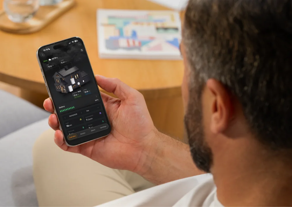 A man checking his home's energy use in the Solis app