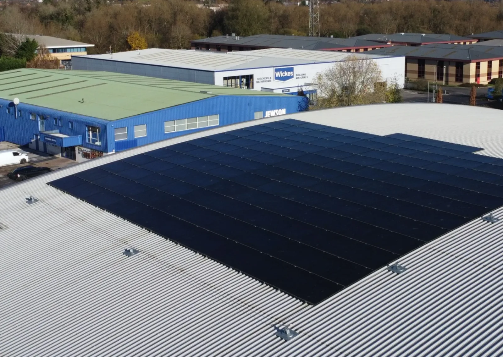 Aerial view of the Viking Self Storage roof with a large array of black solar panels