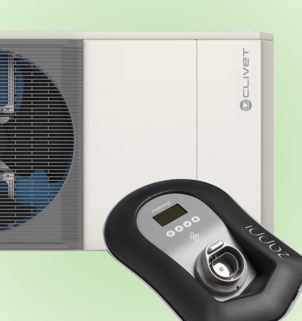 A Clivet heat pump with a myenergi Zappi EV charger in front, on a soft green background
