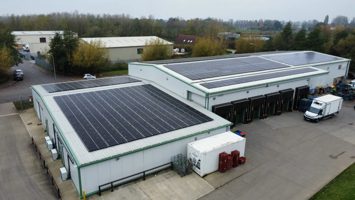 Industrial units with solar panels across their roofs