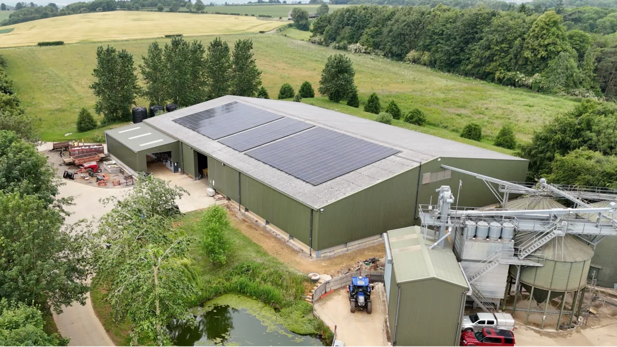 Aerial view of a solar array on an agricultural building